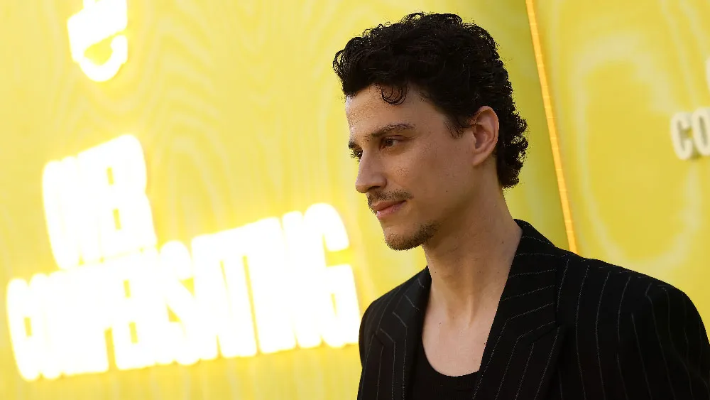 'I Just Love the Scripts,' Says Adam DiMarco about Revealing 'Overcompensating' Scenes